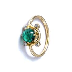 -PRODUCT TYPE - GOLD EMERALD WITH DIAMONDS RING -MATERIAL - GOLD -PURITY - 18K -DIAMOND - 0.07 - APPROX CARAT -STONE - EMERALD - 1.1 - APPROX CARAT -TOTAL WEIGHT - 2.5 - APPROX GRAMS -GOLD WEIGHT - 2.2 - APPROX GRAMS - This piece signifies simplicity that itself is sign of class. Here, we present the essence of diamond with mesmerizing emerald stone. We bet you will love it! -Quality is guaranteed. Our mission is always to satisfy our customers with our offerings, so just relax and place order! Fine Jewelry Emerald Promise Ring, Yellow Gold Emerald Cluster Ring With Center Stone, Fine Jewelry Yellow Gold Emerald Ring, Formal Rings With May Birthstone In Round Band, Emerald Stackable Promise Rings, Brilliant Cut May Birthstone Jewelry Ring, May Birthstone Jewelry Ring With Brilliant Cut, Formal May Birthstone Round Band Ring, Brilliant Cut May Birthstone Ring