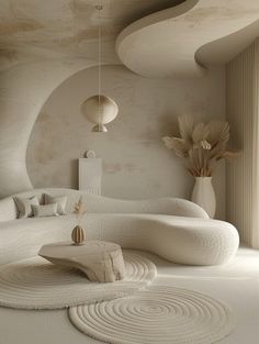 a living room filled with white furniture next to a window and vases on the floor