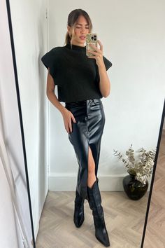 Make a statement in this sleek and sassy Brielle Pu Midi Skirt! Crafted of vegan PU leather, this midi-length skirt with a daring split in the centre will turn heads. A must-have for your autumn wardrobe! Model is 5 ft 6 and wears a size 6. 100% Polyester. Midi Leather Skirt Outfit, Leather Midi Skirt Outfit, Leather Mini Skirt Outfit, Midi Leather Skirt, 30th Birthday Outfit, Leather Skirt Outfit, Midi Skirt Outfit, Pencil Skirt Outfits, Autumn Wardrobe