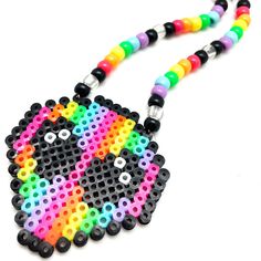 It's Time To Unleash Your Rave Spirit And Beam Into A World Of Neon Wonders With Lasr Alien Rainbow Rave Kandi Necklace. This Otherworldly Rave Accessory Combines An Alien Shaped Pendant With Rainbow Vibrant Beads Colors, Creating A Cosmic Statement Piece That Is Out Of This World. Let Out Your Inner Alien, And Radiate The Magic Of The Universe. "Alien Rainbow Rave Kandi Necklace Necklace Length: 28"" Necklace Drop: 14"" Pendant Size: 3""H X 3""W Round Shaped Acrylic Beaded Detail Alien Shaped P Barbie Kandi, Rave Crochet, Alien Necklace, Kandi Necklace, Floral Statement Necklace, Black And White Necklaces, Rave Accessories, Rhinestone Statement Necklace, Wood Bead Necklace