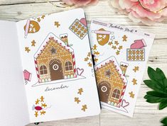 two notebooks with gingerbread houses on them