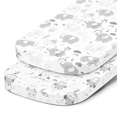 two baby mattresses with elephants on them