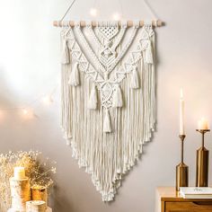 PRICES MAY VARY. 【Chic Design】The macrame wall hanging inspired by tribal objects, ethnic art, and boho design,Featuring hand knotted macrame textiles, layered fringe details, geometric wave knit patterns, andgrey and white line, Its unique design integrates into any home or office decor. 【Premium Quality Macrame】: Unique boho room decor, this meticulously knitted wall hanging macrame with beautiful geometric weaving pattern is made of natural rope,which knotted on the wooden dowel,and features Apartment Nursery, Bohemian Crafts, Tassel Crafts, Boho Macrame Wall Hanging, Macrame Wall Decor, Macrame Wall Hanging Patterns, Boho Room Decor, Woven Tapestry, Macrame Wall Art