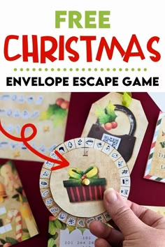 a hand holding up a christmas envelope escape game