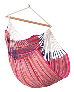 a pink and blue hammock hanging from a wooden pole on a white background