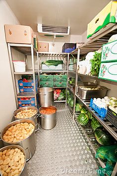 an industrial kitchen filled with lots of food