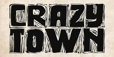 the words crazy town written in black ink