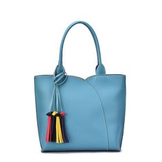 Casual and contemporary, this Mellow World Allure shoulder bag fits all your essentials and is perfect for everyday wear. 12" H x 15.5" W x 3.5" D Drop down handle length: 8" Zipper closure Silver-tone hardware Interior: 2 zip pockets, 2 slip pockets Multi colored removable tasselCONSTRUCTION & CARE Faux Leather, polyester Spot clean Imported Size: One Size. Color: Blue. Gender: female. Age Group: adult. Cool Accessories, Elegant Bags, Fashion Handbags, Purple And Black, Multi Colored, Bucket Bag, Fashion Bags, Vegan Leather, Zipper Pocket