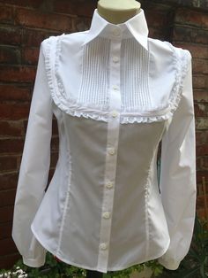 "Feminine and elegant ladies white shirt. A must have piece of clothing for every woman. With pencil skirt at work or just with jeans Great for all. Cotton fabric. SIZE S - US 6, UK 8, EU 36 bust: bust around 34.5\"/90cm Waist: waist around 27.5\"/70cm Hips: hips around 34.5\"/90cm SIZE M - US 8, UK 10, EU 38 bust: bust around 37.5\"/95cm Waist: waist around 29.5\"/75cm Hips: hips around 37.5\"/95cm SIZE L - US 10, UK 12, EU 40 bust: bust around 39.5\"/100cm Waist: waist around 31.5\"/80cm Hips: Ladies White Shirt, Plus Size Princess, Steampunk Blouse, Victorian Shirt, Pirate Shirt, Cowl Neck Shirt, Lagenlook Clothing, Victorian Blouse, Princess Fairy