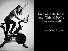 a woman is riding an exercise bike with a quote from robinn avon on it