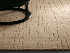 a coffee table sitting on top of a rug