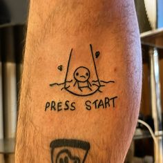 A picture of someone's arm with a black and white Binding of the Isaac themed tattoo. It shows the start menu of the game with Isaac sitting in the basement with a beam of light from above and surrounded by two flies The Leftovers Tattoo, Comic Sans Tattoo, Ultrakill Tattoo, Outlast Tattoo, Binding Of Isaac Tattoo, Invincible Tattoo, Binding Of Isaac Art, Undertale Tattoo, Block Tattoo