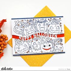 a handmade halloween card with pumpkins and jack - o'- lanternes