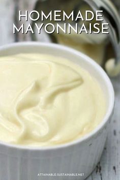 homemade mayonnaise in a white bowl on a wooden table