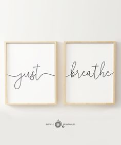 two framed art prints with the words just breathe