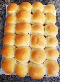 rolls sitting on top of each other in a basket