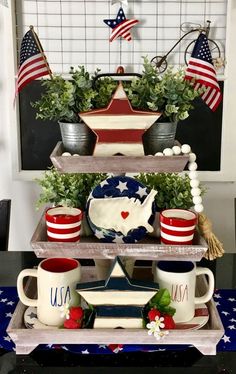 patriotic dishes and cups are stacked on top of each other