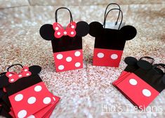 four bags with minnie mouse ears on them