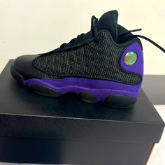 Air Jordan 13 Retro Gs Black/Purple Sporty Purple High-top Basketball Shoes, Sporty Purple Jordan Shoes For Streetwear, Purple Sporty Jordan Shoes For Streetwear, Purple Lace-up Jordan Shoes For Streetwear, Purple High-top Basketball Shoes With Air Max Cushioning, Purple Jordan Shoes For Sports, Purple Basketball Shoes With Air Max Cushioning, Purple Low-top Basketball Shoes With Air Cushioning, Purple High-top Jordan Shoes