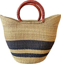 Designed and produced exclusively for the ADE collection, this statement piece is a collaboration between author-designer Nasozi Kakembo and The ADE Bolga artisan Adongo and his team in Bolgatanga, Ghana. Embellished with a leather-bound handle, we designed and produced this basket tote just for you. Each basket takes over a week to complete using skills passed down through generations and shared among community members and expert artisans. Entirely handmade from durable elephant grass, this multi-purpose basket doubles as functional art, a statement planter, or even a chic place to store your firewood (all seen in The African Decor Edit). This basket is an ADE Capsule and xN Studio exclusive, made by Adongo (meet him on our YouTube channel) This purchase directly supports artisans and the Basket Wall Decor, Basket Tote, African Decor, Market Tote, Brand Story, Functional Art, Baskets On Wall, Statement Pieces, Youtube Channel