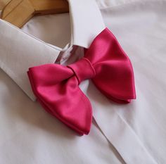 "Oversized Bow Tie in Magenta Pink Color  Satin Pre-tied and adjustable strap. Bow tie size - Width: 12 cm /4,7\" | Height: 10 cm / 3.93'' The adjustable strap takes it to 21\" in length, making it a great accessory that can be adjusted for comfort and fit or given as a gift if you are unsure of neck size. Perfect for formal or causal use. **bowties are shipped in a small shipping box to keep them from being damaged** Always made by hand and to your special order. Weddings and groups are welcome." Pink Satin Bow Tie For Wedding, Hot Pink Bow Tie, Pink Wedding Accessories, Pink Bowtie, Bow Tie Groomsmen, Bridal Parties Colors, Grey Bow Tie, Toddler Bow Ties, Wedding Bow Tie