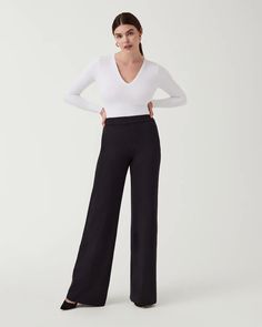 Designed with smoothing premium ponte fabric, this totally machine-washable Wide Leg pant features a comfortable pull-on design and offers a sleek look. Designed to hit at your natural waist Relaxed fit with leg lengthening wide leg Inseams: Petite 30” (recommended for 5’4” and under), Regular 32.5", Tall 35" (recommended for 5’9” and above) Full Length (perfect to wear with a 3-4" heel) If you prefer to wear flats or sneakers, we recommend selecting a shorter inseam. Classic Black and Charcoal Preppy Resort Wear, Europe Clothes, English Roll Arm Sofa, Summer Workwear, Roll Arm Sofa, Southern Preppy, Cropped Wide Leg Pants, Black Wide Leg Pants, Wide Leg Dress Pants