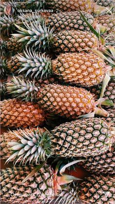 a pile of pineapples sitting next to each other