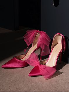 Mali Satin Bow Heels in Hot Pink Introducing the Mali Satin Bow Heels, an exquisite addition to any stylish wardrobe. Crafted from premium satin material, these heels feature a delicate bow detail that adds a timeless elegance and sophistication. Detailed Features Buckle Fastening: A secure ankle strap with buckle fastening ensures a comfortable fit while walking or standing. Heel Height: Standing at approximately 9cm (3.5 inches), these heels provide the perfect balance of height and comfort, making them suitable for various occasions. Our Mali Satin Bow Heels are designed to cater to modern fashion enthusiasts who appreciate a blend of elegance and practicality. The hot pink color is sure to make you stand out in any setting while remaining true to the classic charm of satin material. No Pink Bow Heels, Pink Satin Heels, Satin Bow Heels, Hot Pink High Heels, Hot Pink Heels, Heels Aesthetic, Stylish Heels, Hot Pink Color, Elegant Heels