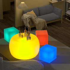 an illuminated table in the middle of a living room