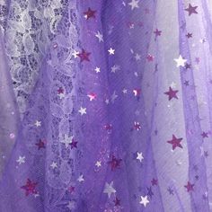 purple and white sheer fabric with stars on it