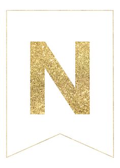 the letter n is made up of gold glitter and has a white border around it