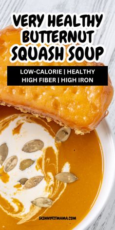 very healthy butternut squash soup in a white bowl with pumpkin seeds on top and the text overlay reads very healthy butternut squash soup low - calorie healthy high fiber