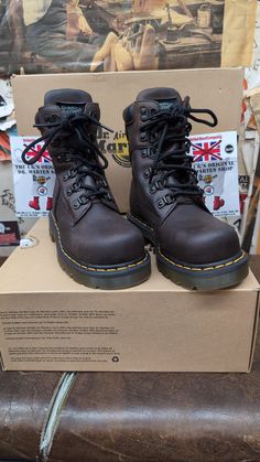 These are a very rare pair of safety rated steel toe Dr Martens boots. The boot itself has 6 speed lace eyelets and comes above the ankle,and have a nice leather padded collar offering extra comfort . The sole unit is the Hud version. They were only used on this and a couple of other boots. Super strong and extremely comfortable. This boot was made in Asia, but to an extremely high standard. They will last those who buy many years. We have UK sizes 3-6 available  European sizes 36-39 USA ladies Steel Toe Lace-up Boots For Streetwear, Rugged Steel Toe Martin Boots, Rugged Lace-up Martin Boots With Steel Toe, Rugged Steel Toe Lace-up Martin Boots, Brown Boots With Reinforced Toe For Streetwear, High Ankle Lace-up Boots With Reinforced Toe For Streetwear, Lace-up Work Boots With Vibram Sole, Lace-up Waterproof Boots With Reinforced Heel For Streetwear, Sturdy Lace-up Boots For Outdoor Work