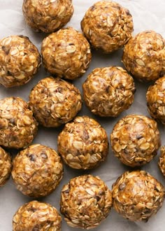 a bunch of oatmeal balls sitting on top of a piece of paper