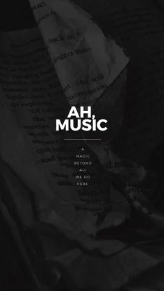 the words ah music are written in white on a black background with crumpled paper around it