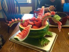 there is a watermelon boat made to look like it has been cut in half