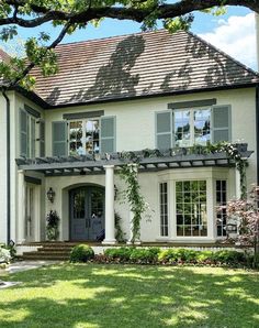 a large white house with lots of windows