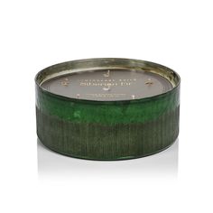 a green tin with a clock on it