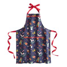 an apron with christmas decorations on it and red ribbon tied around the neck, is shown