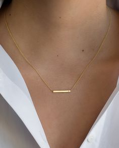 "14K solid gold Bar necklace with a tiny diamond , comes in the gold color of your choice, and length of your choice, dainty and absolutely amazing! The perfect everyday necklace, by itself or layered. made in L.A. Size: Approx. 1\" Diamond: 0.01 ct wt Ships in 5 to 7 business days Comes gift ready in our beautiful branded jewelry box." Dainty 14k Gold Bar Necklace Gift, Minimalist Everyday Bar Necklace With Delicate Chain, Classic Everyday 14k Gold Bar Necklace, Minimalist Bar Necklace With Delicate Chain For Layering, Dainty Yellow Gold Bar Necklace As Gift, Everyday 14k Gold Bar Necklace With Delicate Chain, Dainty Yellow Gold Bar Necklace For Gifts, Minimalist 14k Gold Bar Necklace For Everyday, Minimalist 14k Gold Filled Bar Necklace For Gift