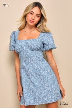 Make any spring day the best day with an adorable look like the Lulus Flawless Darling Blue Floral Chambray Tie-Back Mini Dress! Lightweight cotton-blend woven chambray shapes this too-cute dress that boasts a delicate floral print throughout as it shapes a lightly gathered bodice, a square neckline, and trendy puff sleeves with elastic at the shoulders and cuffs. The high, empire-style waist (with elastic at the back for fit) tops an A-line skirt that finishes at a flirty mini hem. Long tying s Cute Honeymoon Outfits, Honeymoon Dresses, Grade 8 Grad Dresses, Grade 8 Grad, Short Summer Dress, Honeymoon Dress, Lulus Dress, Mini Dress Floral, Casual Formal Dresses