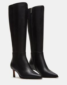 Chic Pointed Toe Knee-high Boots, Sleek Wide Calf Mid-calf Boots With Pointed Toe, Formal Wide Calf Mid-calf Heeled Boots, Wide Calf Pointed Toe Knee-high Boots For Office, Tall Pointed Toe Heeled Boots For Work, Tall Pointed Toe Heeled Boots For Workwear, Wide Calf Pointed Toe Heeled Boots For Work, Pointed Toe Knee-high Boots With Reinforced Heel For Work, Office Heeled Boots With Pointed Toe And High Fit