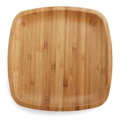 an empty bamboo cutting board on a white background