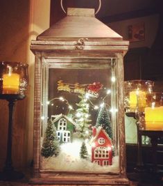 a lighted lantern with christmas decorations in it