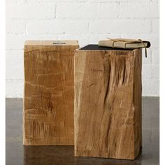 two wooden boxes sitting on top of a table