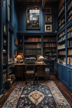 an old fashioned library with blue walls and lots of bookshelves on the shelves