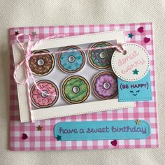 a pink and white card with doughnuts on it that says donut worry be happy have a sweet birthday