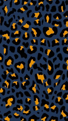 an orange and black animal print pattern on a dark blue background with yellow spots in the middle