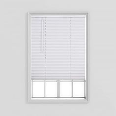 a white window with blinds in it