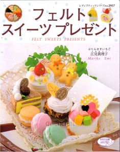 the cover of an article in japanese with small cakes and other desserts on it